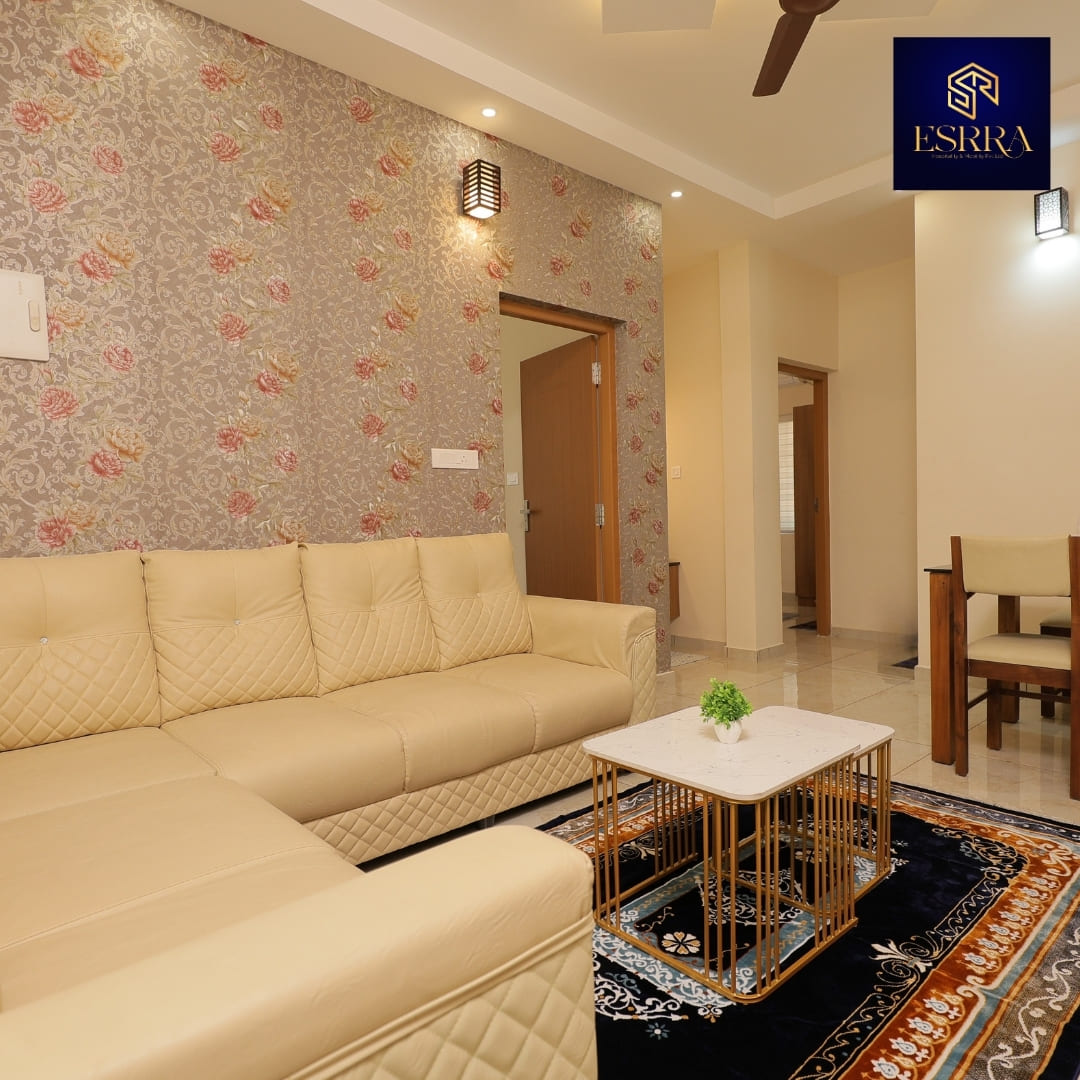 Best 2BHK daily rent flat in Ernakulam with a beautiful, warm living room and 2 AC bedrooms; fully equipped kitchen with washing machine and TV for a comfortable short or long stay with 24hr check-in.
