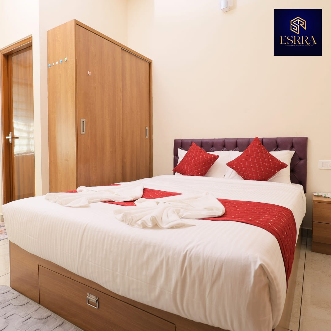 Couple and family friendly 2BHK luxury flat in Ernakulam with privacy, AC, and free WiFi; best affordable daily rental with a calm environment.